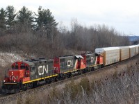 These days catching a GP9 leading a train is something you don't ignore. They have already vanished on CP and their numbers have been greatly reduced on CN over the past decade as well. Since local train 547 was relocated a number of years ago from Malport to Aldershot, catching GP9s in the lead passing through Scotch Block was a rare occurrence. This train was most likely an extra out of Aldershot heading to Toronto, with a trio of four axle Geeps up front, and the sound of them struggling up the grade was defining.