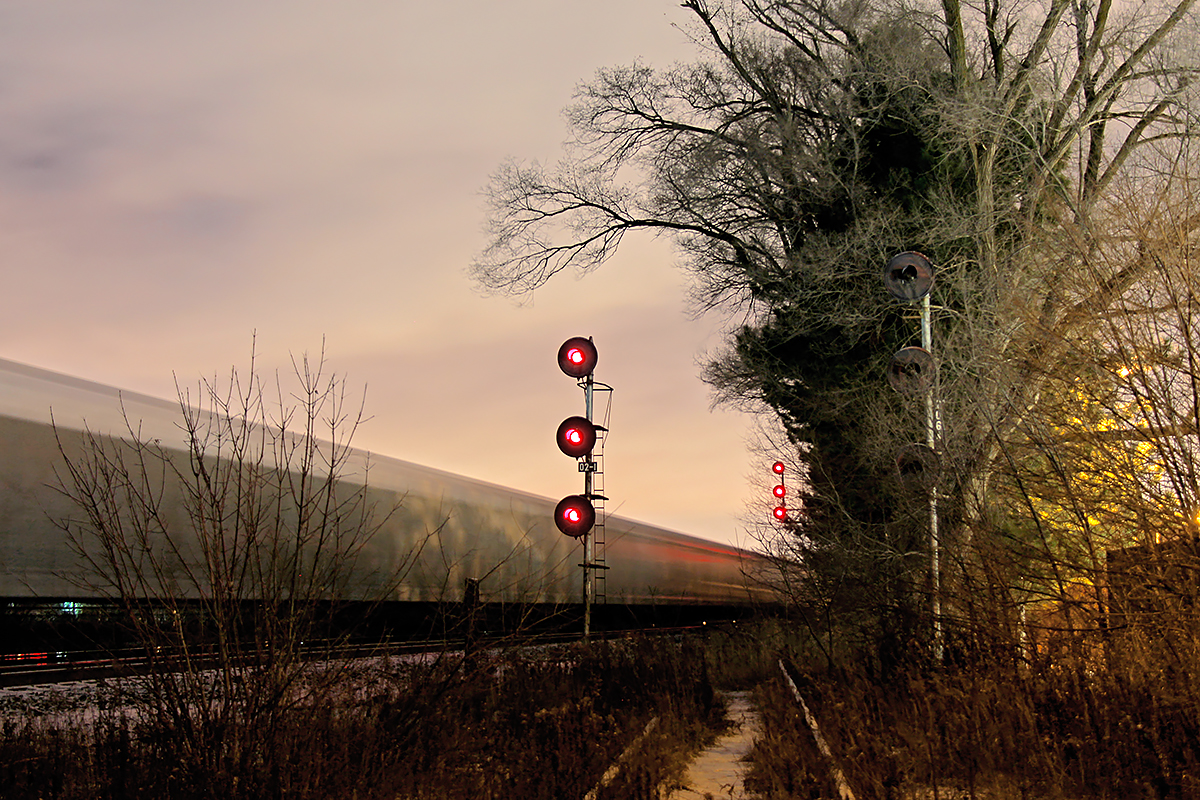 Remember this photo?

http://www.railpictures.ca/?attachment_id=21253

Well, evidently, thinks have changed a bit. You can read the description in that photo to get an idea of what has led up to this point.

Signal 2072 went dark sometime in mid 2016, that being the approach signal to Leaside.. Signal 2082 went dark a few years ago, which is the approach signal to the interlocking at Don. Signal 2094 is the northbound signal at the Don interlocking, and it is also now off. Signal 2065, pictured here though, ultimately was the last signal on the CP Don Branch to beam its searchlight bulbs, and I believe that ended in November 2016. Having done so, it would've displayed solid red for nearly nine years since the 2007 CP Holiday train last ran past it. It's a clear of demise of the Don Branch, and many in the city already know this line is no longer in use.

With the switch removed at Leaside onto the Don Branch, a City of Toronto project a little north of where the branch splits away from the CN Bala Sub has led to a massive hole in the ground. Therefore, the section of track there has been removed, and the Don Branch is now physically inaccessible to any heavy rail traffic. Not that this matters, as the track is not any condition to have a train operate on it anyways.

While the very southern leg of the CP Belleville Sub (as it is officially known) seems to be nearing its end as existing track, that is unlikely the case. Similar to the way CP used it for passenger trains into Union back in the day, Metrolinx purchased the line in hopes they will run GO trains on it at some point in the future. Even Via Rail made a case to run an alternate Toronto-Ottawa-Montreal route via Peterborough, which would most likely need to use this route. However, most of what comes from Via Rail is broken dreams, so realistically, keep your eyes on GO. In the meantime, the line will continue to wither away, probably for another decade at least. Regardless, it is pretty much expected that a future version of the Don Branch will not include the searchlight signals, and perhaps not the Half Mile bridge either if consistent double track is implemented as part of Metrolinx's Regional Express Rail network.

Until then, enjoy the Don Branch for what it's worth. As for the train in question here, the timing of the upload is fitting, since CP 241 no longer exists as of this past week, and has been replaced by 141. Things change quickly on the railroad. Thankfully the Don Branch will have the time capsule over it for some time to come (hopefully). 

My sluggish uploading is due to inconsistencies in my ever changing life. I'm still taking plenty of photos though, and should be able to upload more soon.