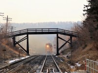 RG319 departs in a cloud of grinding residue after passing under the wooden walk bridge at MM37.