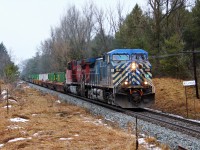 Todays CP240 is led by CEFX 1031 with CP 9819 as it passes the Killean name sign at MM 54 on the Galt Sub. 