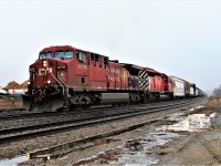 After getting stuck coming up the hill in Milton and getting a push from CP 141, CP 235 heads out of Guelph Junction with CP 9779 and a very nice treat in CP 6050 (SD40-2) for power. The SD40-2 is even on power. 