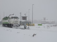 The inagural run of GO Transit's permanent weekend service to Toronto boards passengers at the Allandale Waterfront Station. The weather demonstrates the benefit of this service.