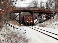 CP 8931 leads CP 8553 under the Snake Road wooden bridge with an empty load of ballast gondolas on its way to Guelph Junction