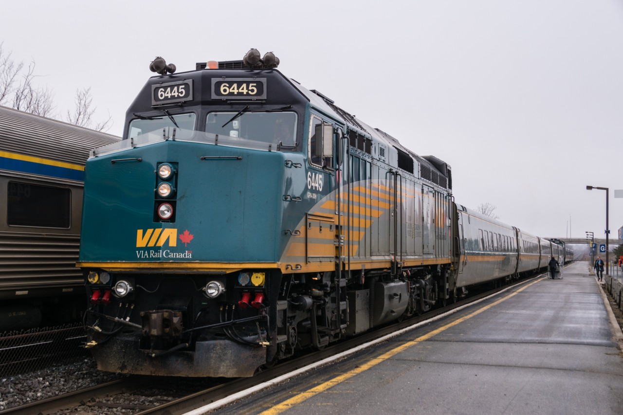 It's dreary but the fog and drizzle have temporarily subsided while Kingston station staff loaded a passenger using a mobility device. The second J train of the day is getting ready to blast off for its next stop at Brockville. After splitting there, 6445 and company on #62 will continue on to Cornwall, Dorval and Montreal, with 6408 taking #52 to station stops at Brockville, Fallowfield and finally, Ottawa.