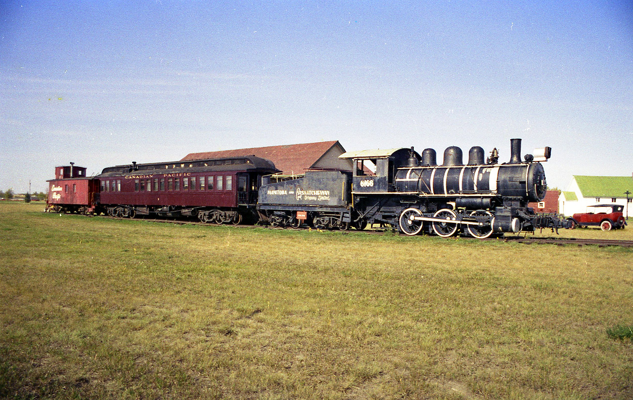 Currently this 0-6-0 sits in the Western Development Park at Saskatoon as CP 2166, it's original number from when it was built back in 1905. It became CP 6166,then Manitoba & Saskatchewan Coal 6166 (as pictured), then Western Development Museum 6166 and now is back to CP 2166; having moved from North Battleford where I photographed it sometime in between. These museum parks are really something; four of them around the province and all well worth the visit. Now I am wondering, since it has been 40 years since I have seen this locomotive, if anyone has some photos to share of it at its new location and  new paint.