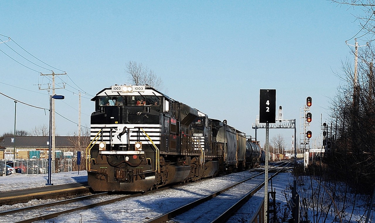 NS 1003 a SD-70 ACe leading  loco with NS-8364 a C40-8w  pulling 140 freights cars rte 527 a mix with Rte 529 going to Point St-Charles make a drop and after to Taschereau Yard near Dorval MTL
