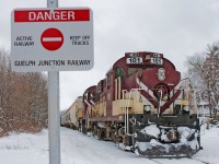 <b>Last shift for 2016</b> This pair of MLW's sit on the mainline as we take a quick break before heading back to Guelph Jct with 6 empty hoppers from Traxxside. 