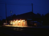 Nice warm early summer night in Parry Sound. I had been sitting in the station yakking it up with the agent/operator (Jimmie Bell) and decided I would wander out for a night shot of the building. Something I had not yet done there. I was greeted with smirks when I got back into the safety of that station. Only an out of towner would be dumb enough to take on combat with the voracious mosquitoes. Yeah, I lost. It was a long day out there taking pictures because the southbound Canadian was very late; showing up somewhere around 11PM. Normally it was early evening back then.