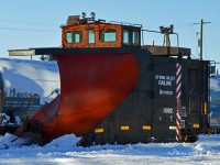 Ottawa Valley Railway Snow plow RLK 0002 sits in the Yard January 6 2016 after being serviced by the OVR shop crew. Both the Plow and spreader were serviced; as Snow in the yard and on the main line is building up.