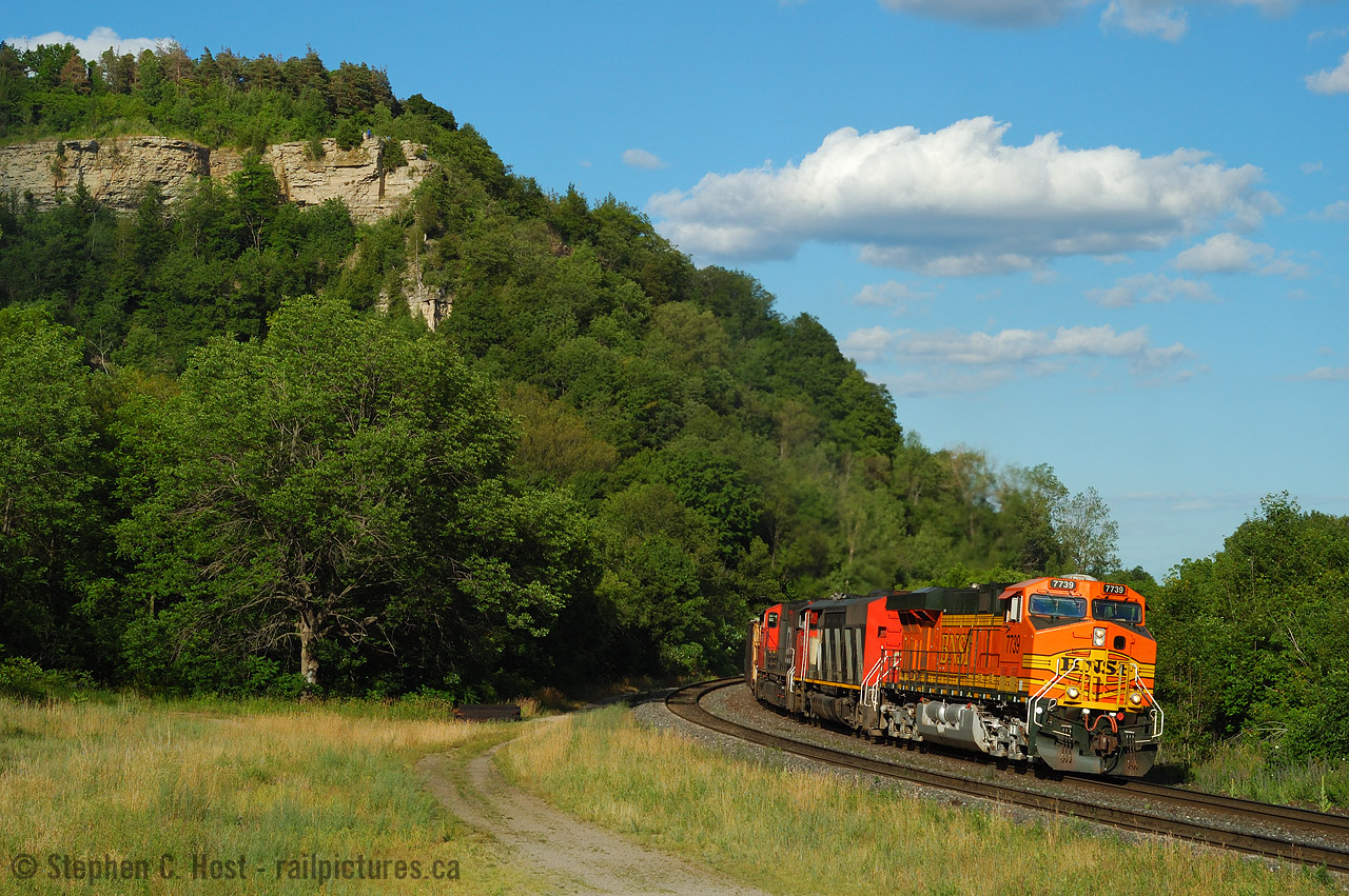 In the shadow of many photographers, such as Arnold Mooney who seems to have been Dundas's #1 photographer in the 1970's - The dundas peak has been drawing photographers for many decades. There would have been a station smack dab in the middle of my shot.. too bad. At least I had a foreign leader to soothe my wounds, and the scenery is just fantastic.