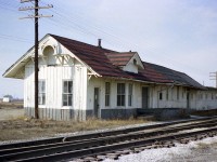 The old Pere Marquette station in Ruthven. The PM became under control of the Chesapeake & Ohio long before I shot this image in 1977. The station is abandoned, fallen into disuse. Too bad it could not be saved, for it was of rather interesting construction. The building was gone soon after I took this photo.