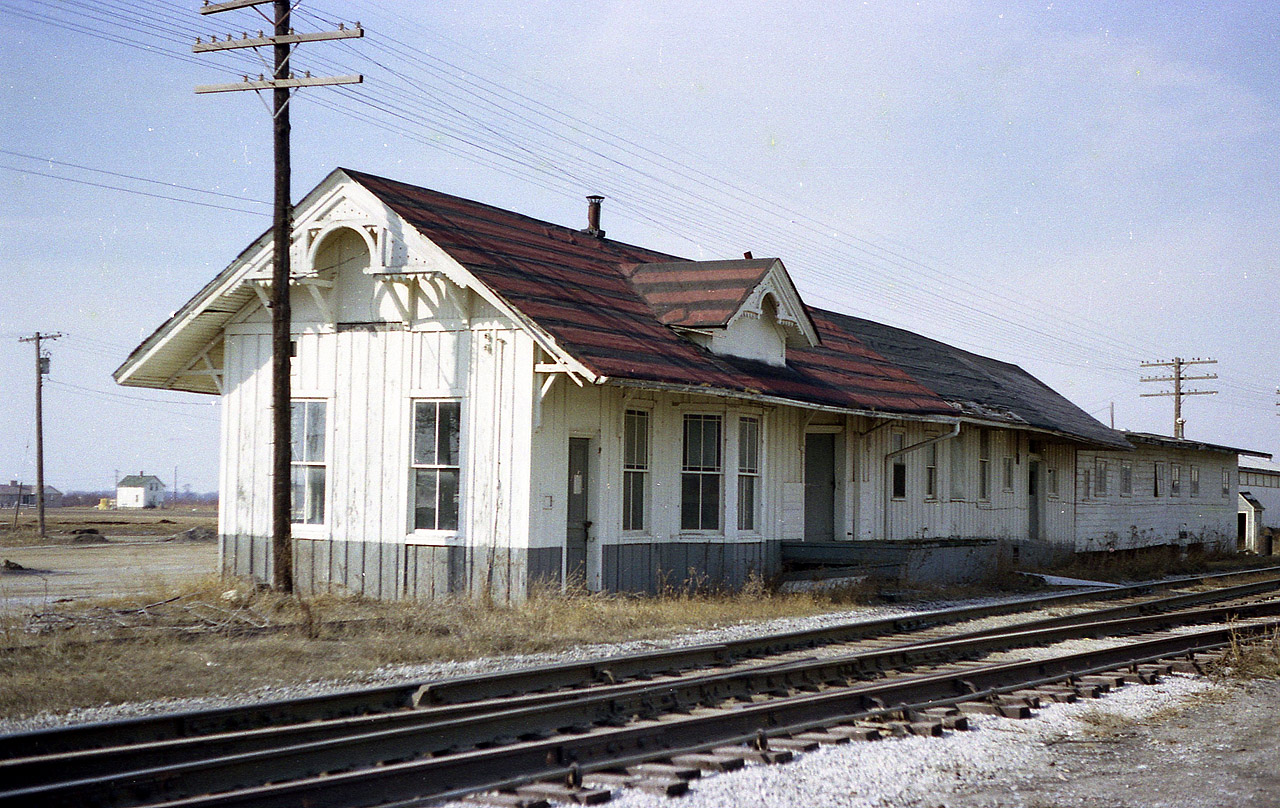 The old Pere Marquette station in Ruthven.  The PM became under control of the Chesapeake & Ohio long before I shot this image in 1977. The station is abandoned, fallen into disuse. Too bad it could not be saved, for it was of rather interesting construction. The building was gone soon after I took this photo.