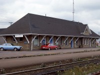 The VIA station at Sackville, NB is a nice basic structure. Too bad it is, of October 2012, closed. The train still stops here, but on-train crews handle baggage after VIA axed the staff here and at nearby Amherst due to funding cuts. It is the same all across the country. The government is bound and determined to kill what there is left in passenger traffic by making it as inconvenient as possible and then plead that "nobody rides the damn thing." At least that is how I see it.
This station opened in 1907, the first building a small wooden building destroyed by fire. The railroad first came to town when the Intercolonial opened here in 1887. A further extension to the Northumberland Strait at Cape Tormentine and a PEI ferry made this location even more important as a junction.
That was then. Not now.