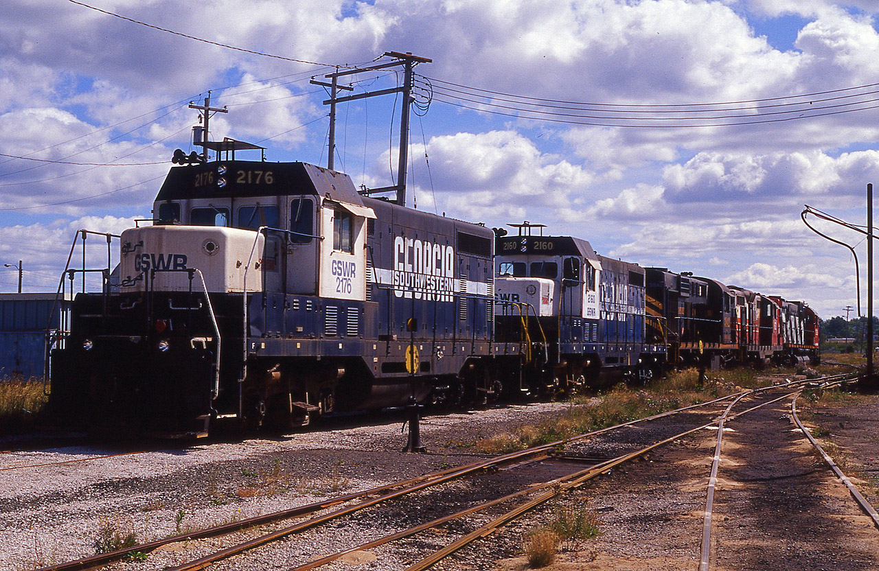 You never know what you might find.  Here at the CBNS shop in Sydney some years ago I came across a couple of odd out of service Georgia Southwestern locos.  They had been acquired in 1998, and eventually scrapped 2008. (what is that fixture behind the horns?) Also in this 'deadline' were CBNS 3842, IORY 62 and former CN 2028, a C-630M, stenciled IBCX (Indiana Boxcar?) and sold to a scrap dealer. I think this is the unit I saw cut up in pieces at Cohocton, NY a few years ago.