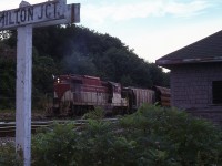 Something I didn't see very often, rarely, actually, was TH&B coming down the CP Waterdown Hill. I was doing the usual late day wander thru the area when I heard a train horn. Coming from the direction of Hamilton West. So I scurried off to this point, hoping to get a shot with the CN "JCT" sign in it. (CP and CN are almost side by side here) And this was as best as I could do before this short train came into view. It is a bit dark on account it is past 1900 and the sun is behind the hill. But the image is certainly different.