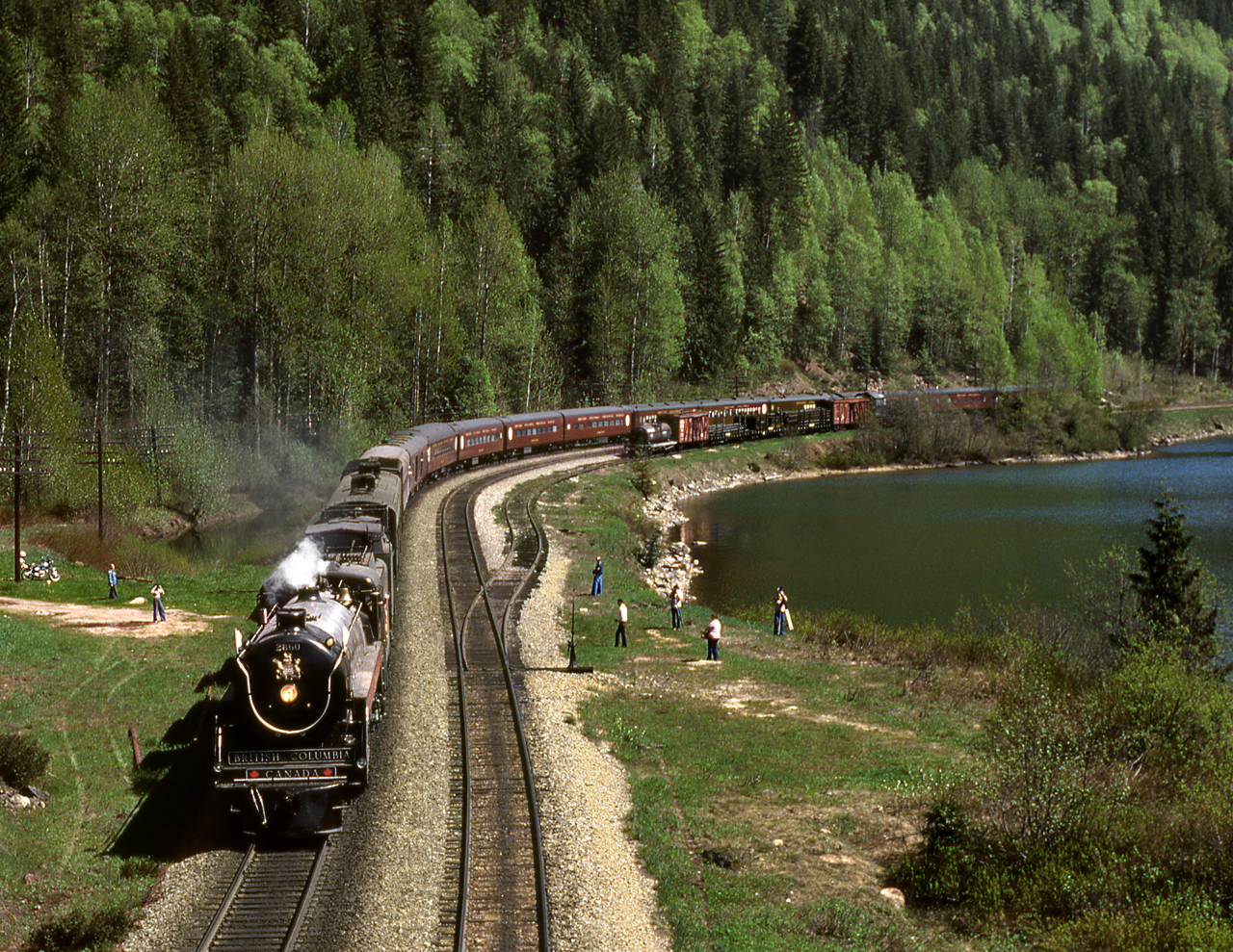 Provincially Owned ex CP H1c 4-8-4 2860 returning from a tourist promotion trip to eastern Canada passes Three Valley siding along Three Valley Gap Lake in Eagle Pass west of Revelstoke.