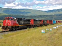 CN nos.2517,2441&2542 are crossing "Grandview Flats" with a load of empties bound for Armstrong and Lavington.
