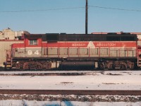 Former Conrail GP38 7666 was purchased by the Bangor & Aroostook Railroad in 1983 as there #94 and is shown at Agincourt on it's way to being rebuilt. It is currently WAMX (WATCO Rail Services-Webb Asset Management)3838.