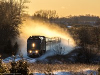 Golden Hour on the Kingston Sub!
VIA 46 kicks up a fresh cloud of snow as it blasts through the East end of Newtonville. 
