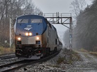 In a very Pacific Northwestern scene, Amtrak 206 hustles through fog, rain, and wind past Lake City in Burnaby, BC, as it hauls the northbound Cascades on the last leg of its journey into Vancouver.