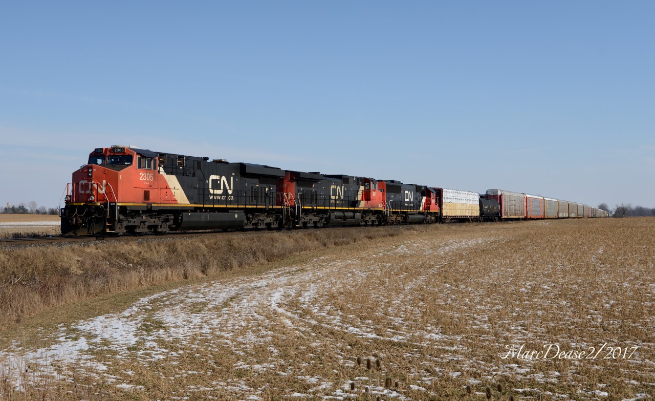 Train 385 waits at Camlachie Side Road waiting to get into the yard at Sarnia, ON., Train 382 was a little delayed.