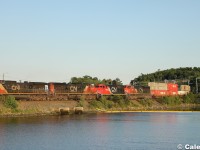 CN 2507 shoots across the fill over the Moirs Mills Pond leading three other units.  With only 2749 footage of train, only the two units at the head are required to be on-line.