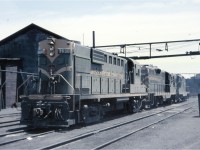 Many have seen photos of the CNR (later SOR) diesel shop in Hamilton, but here's the original engine servicing area during the transition from Steam to Diesel with RS18 3636, GP9 4509 and another sister GP9 in the old yellow and green livery. These facilities, built by the Great Western Railway, were all razed and modernised a few years after this photo was taken.