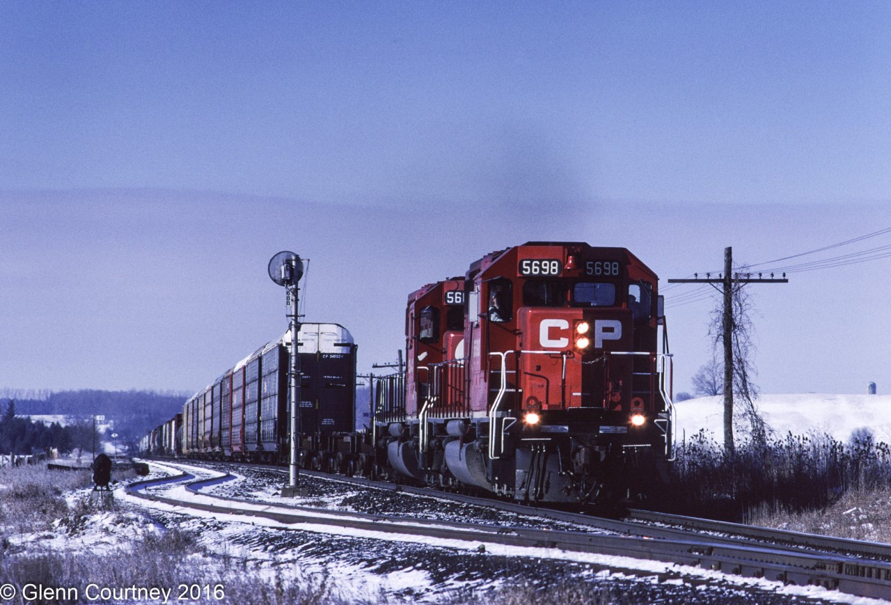 It doesn't seem like this was eighteen years ago! A pair of CPR SD40-2s, which were everywhere in those days, lead #924 down the main at Wolverton