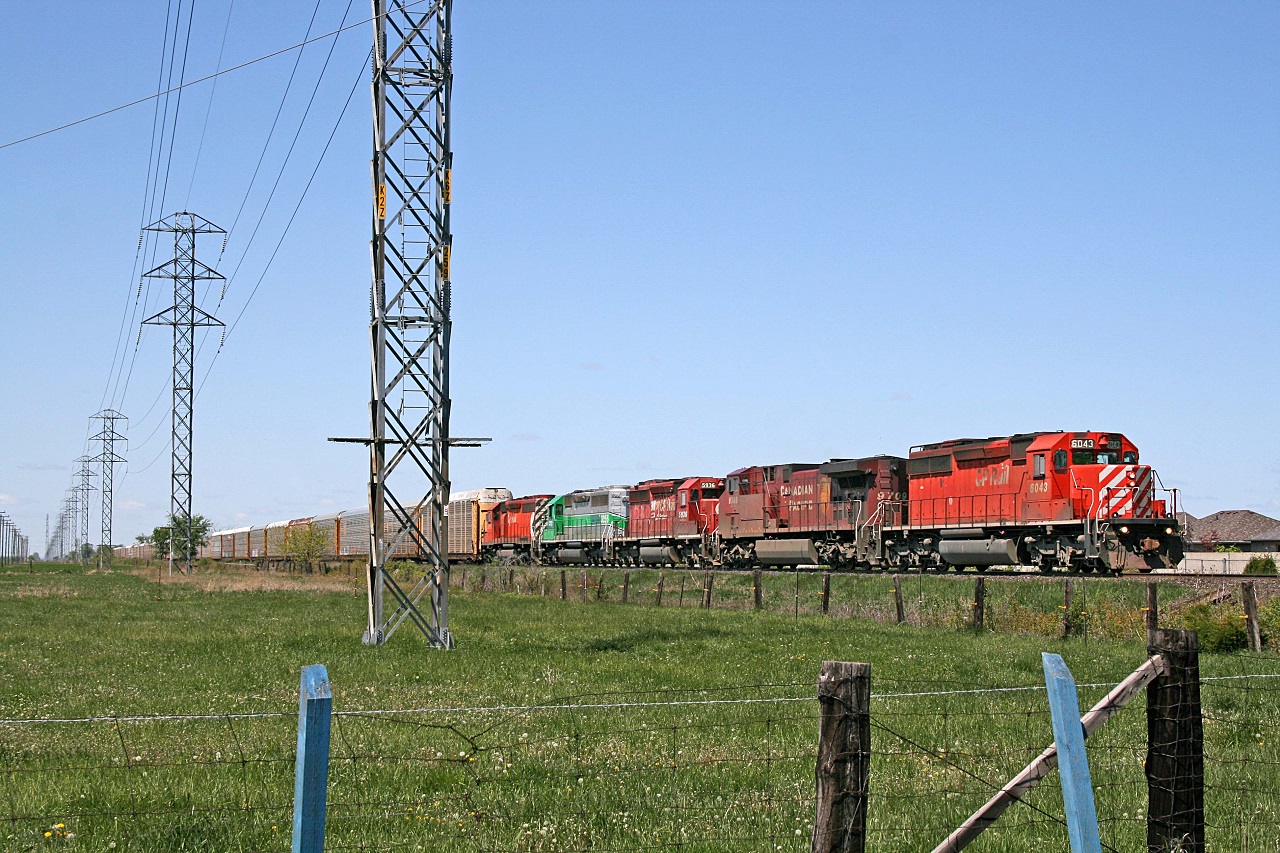 CP 6043, with helpers CP 9709, CP 5936, GCFX 3066 and CP 5749, are eastbound with train 242 at mile 94.5 on the CP's Windsor Sub.
