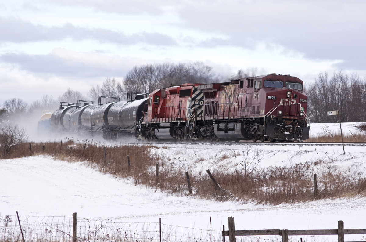 Extra Toronto-Montreal traffic rolls through Port Hope with 8628-6050.