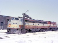 Canadian Pacific E8 1801 is shown at TH&B's Chatham St. shops with an 8500-series passenger service RS10. CP 1801 was one of three E8's built at La Grange for CP in 1949 (1800-1802), which were the only E-units ever built new for a Canadian railway.