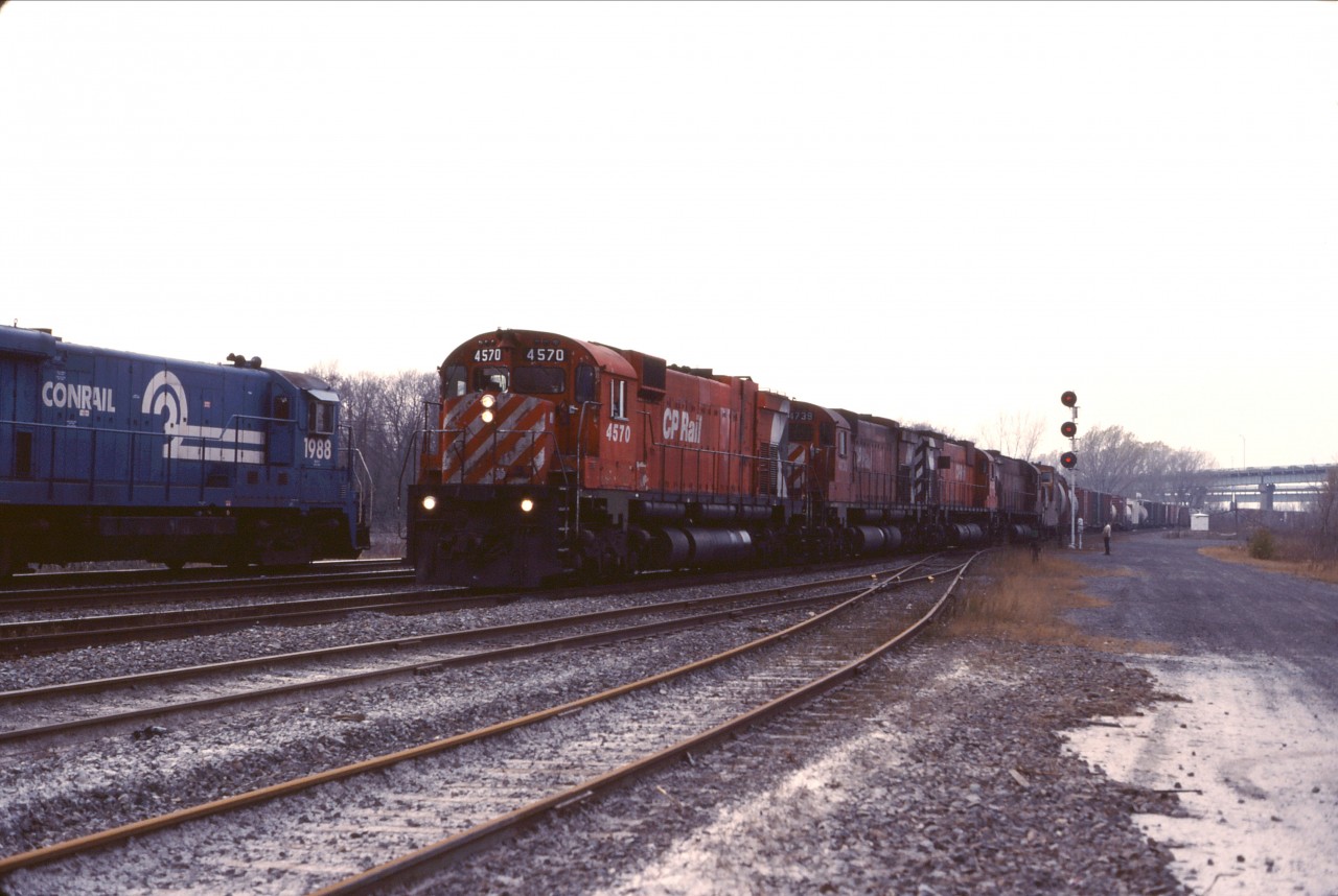 Southbound off the island of Montreal (the Adirondack is a north-south sub!), CP 4570 leads three other "Big Cs" past a Conrail local at Adirondack Jct.