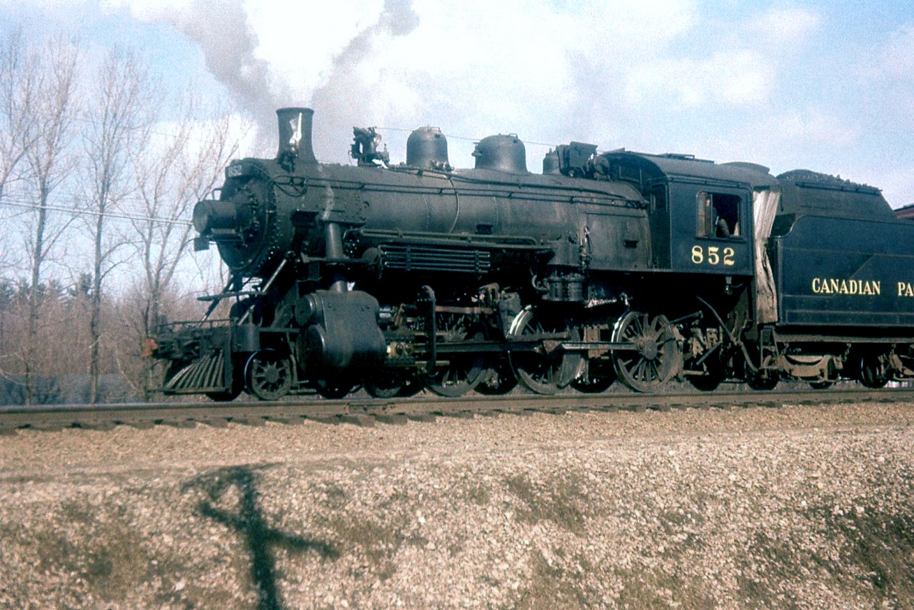 Canadian Pacific D10 852 is shown heading west from Port Credit on the Oakville Turn, on CN's Oakville Sub at Stavebank Road in 1956.
