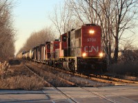 CN 438 led by CN 5704, CN 223 & CN 7274 with 38 cars heads down the CASO on their way to London.