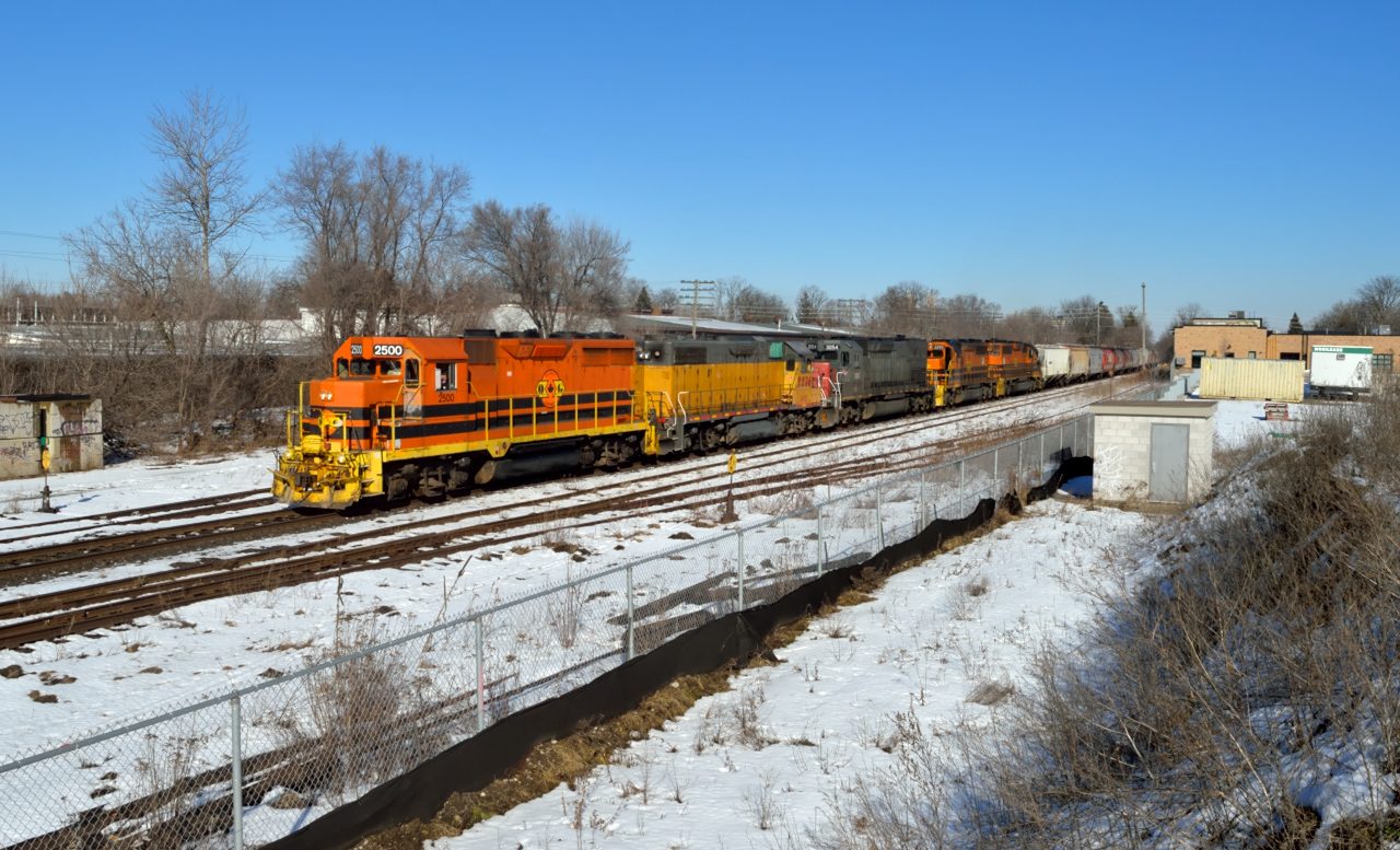 GEXR 431 heads rumbles through Guelph with 83 cars on an unseasonably warm day.  It was nice to have two GP's leading today.  Hopefully spring will be here soon. :)