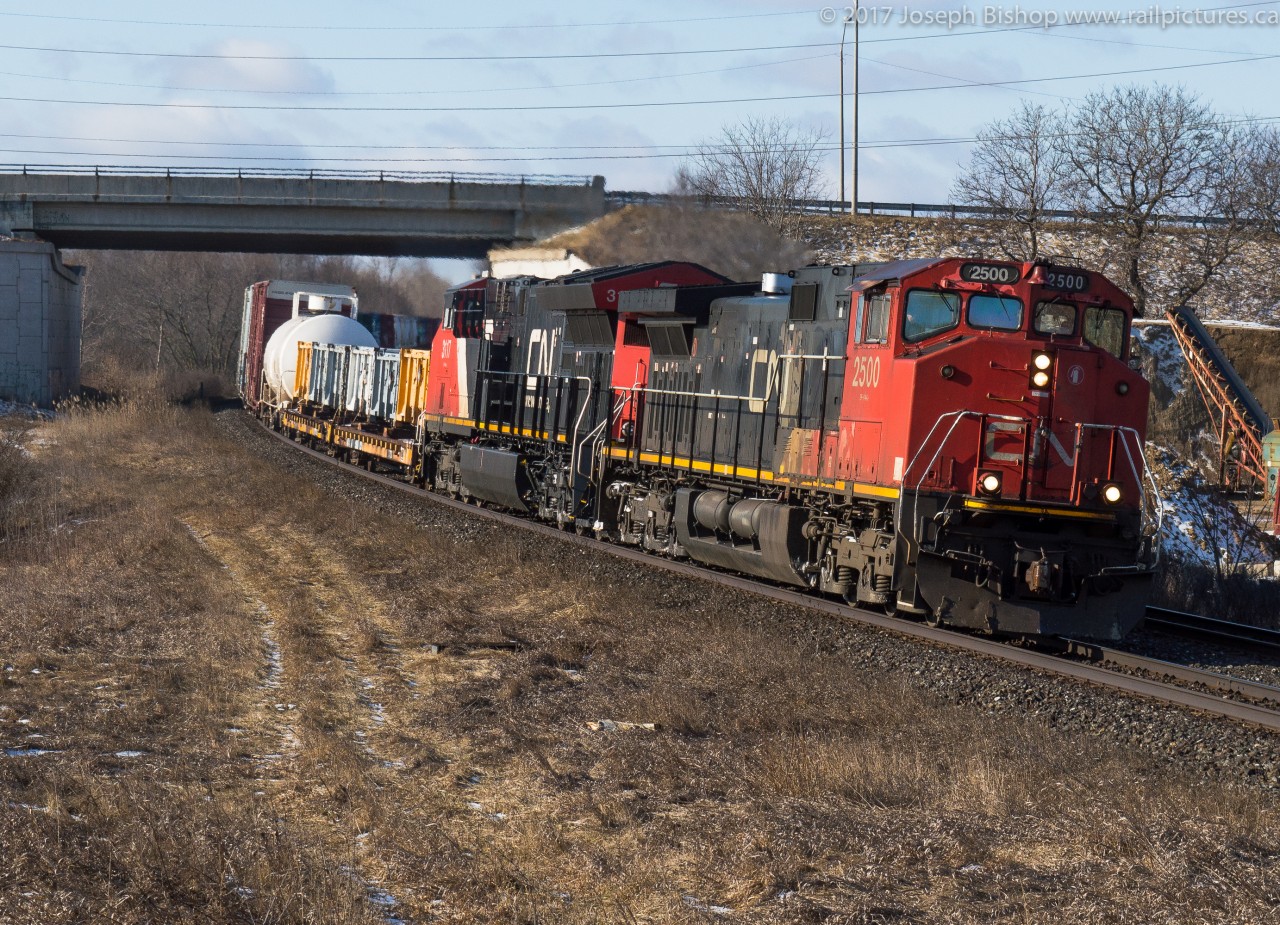 A week after catching CN 2500 leading 435 ours paths crossed again.  This time CN 2500 lead 394 as it approached Garden Avenue with CN 3117 trailing.  It is interesting to note the differences between the two GE models.