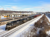 A longer than usual CN 529 is almost finished its run from Rouses Point as it heads west on CN's Montreal Sub with NS 2691, NS 9553 & NS 1101 leading 80 cars. This shot will not be doable for much longer, as CN's tracks here will move to a new ROW a bit further north, probably before the end of 2017.