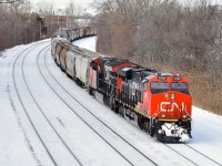 CN 2928 & CN 3004 lead grain train CN 874 around a curve as it slows down for a crew change at Turcot West.