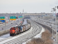 GP9's CN 4102 & CN 7054 have just shoved 7 loaded grain cars onto a cut of empty grain cars on the freight track of CN's Montreal Sub. After, the power will run around the train and it will head to Southwark Yard. Eventually CN X321 will bring them all to Toronto, the loaded grain cars are for GEXR and came to Montreal by mistake on CN 874.