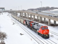 CN B730 with 205 potash loads for St. John, New Brunswick is leaving Turcot West in Montreal after getting a new crew to take it to Joffre Yard. Power is brand new ES44AC CN 2981 and ET44AC CN 3057 up front and ES44AC CN 2806 & ET44AC CN 3068 as mid-train DPU's.