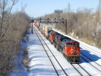 Following an overnight run from Toronto, CN 120 is leaving Taschereau Yard in Montreal this morning after working the yard. It will be in Halifax about 24 hours later, with CN 8806, CN 5778 & CN 2279 up front and CN 8950 mid-train.