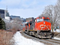 	A late CN 149 is leaving the port of Montreal with CN 2556 & CN 8917 leading 9,602 feet of containers. 
