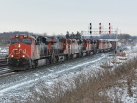 On their way to be reactivated, 3 SD60Fs, most likely lifted in Flat Rock from E231, trail 6 units through the new signals guarding the Norval crossovers. The pre-existing signals at the platform have be deactivated and been angled outwards. This is just one of many changes coming to the Halton Sub with the GO Transit expansion