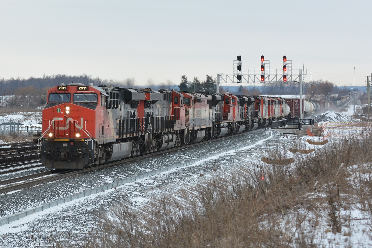 On their way to be reactivated, 3 SD60Fs, most likely lifted in Flat Rock from E231, trail 6 units through the new signals guarding the Norval crossovers. The pre-existing signals at the platform have be deactivated and been angled outwards. This is just one of many changes coming to the Halton Sub with the GO Transit expansion