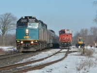 Running block to block with CN M302, VIA #2, "The Canadian", passes tied down A450 in the Pine Orchard siding