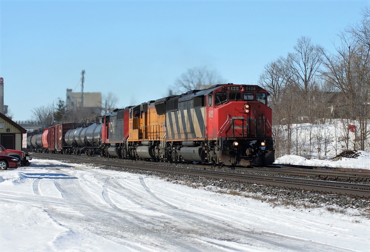 CN SD50F 5428 leads eastbound train 302 by the Woodstock station with Union Pacific SD70M 3928 and SD60F 5537.
SD50F 5428 was eventually retired by CN on December 5, 2008. On December 14, 2008 CN had officially retired their last SD50F, 5414, which removed the entire class from the railway's roster.