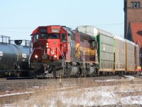 With 385 hot on their tail-end, train 279 with SD40-2 5380 and WC SD40-2 6003 is pictured curving through Brantford, Ontario on February 24, 2007. CN SD40-2 5380 originally started life as Missouri Pacific Railroad 799 while WC SD40-2 6003 was built by GMD in London, Ontario for the Algoma Central during 1973 and numbered 185. 