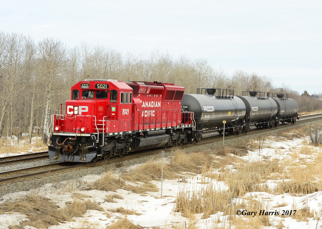 U11 CP-5021 at mile 3.7 heading west to service superior propane at Dexter 3cars out and 3 cars in.