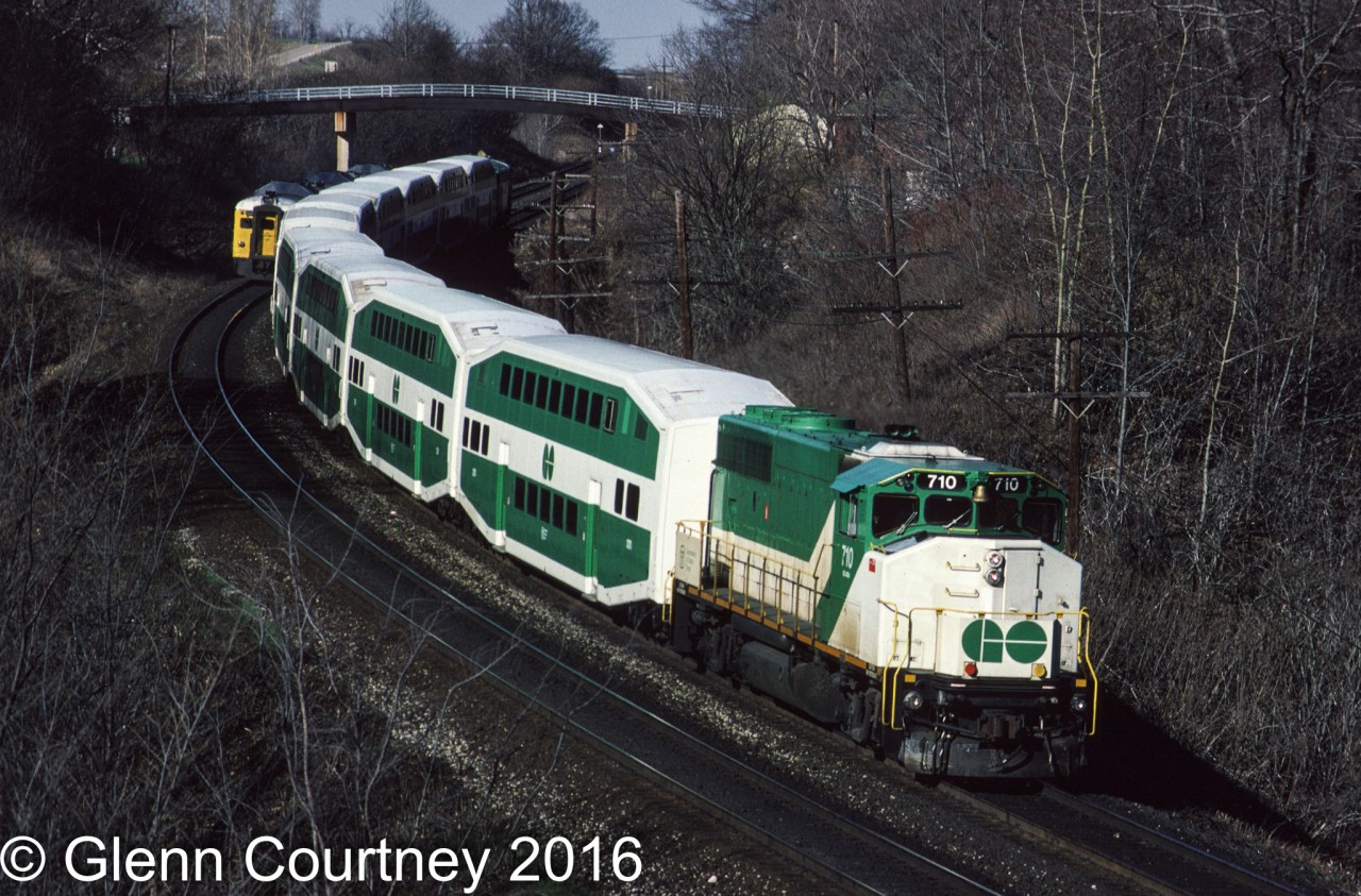 I just posted a shot of sixty year old F units hauling freight, here's a shot taken almost 30 years of GO bilevels that can still be found hauling commuters around the GTA today. The GP40-2W is no longer in the passenger hauling business having been sold to CN in 1991 after GO standardised their motive power situation with a fleet of F59PHs.
