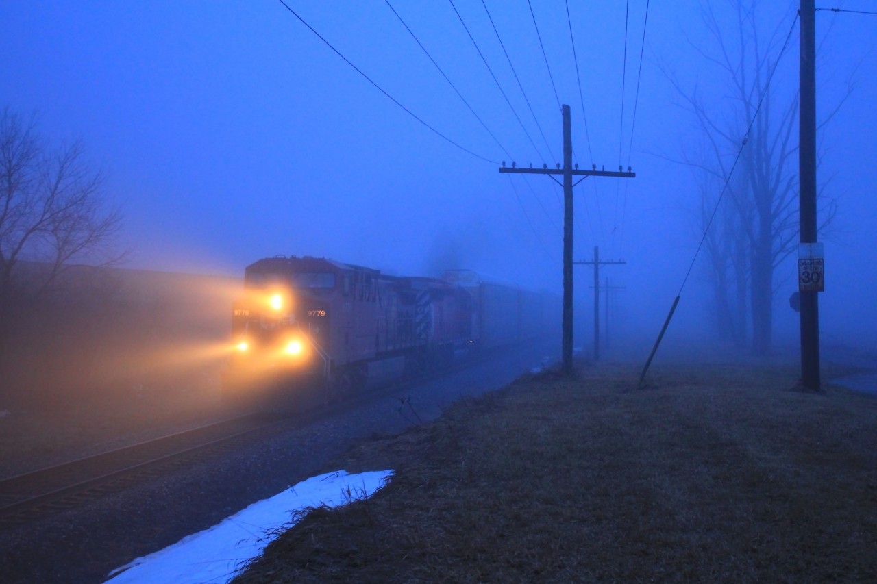 CP 234 leaves Wolverton with a pacman sd40 with snowplow mods in trail. Nice train to see on my birthday!